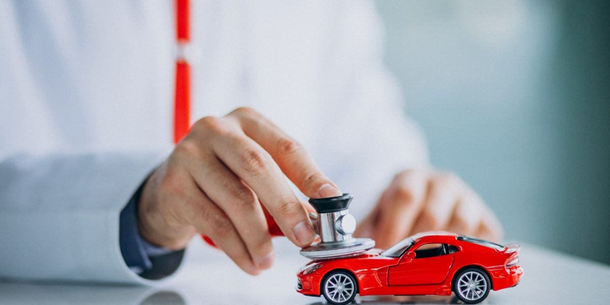 Car doctor with stethoscope in a car showroom